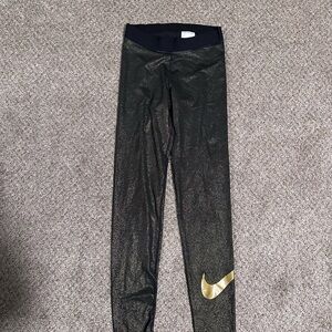 Nike Woman’s Gold Leggings